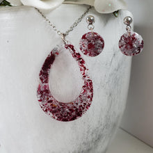 Load image into Gallery viewer, Handmade real flower teardrop pendant necklace accompanied by a pair of circular stud earrings made with rose petals and silver flakes preserved in resin. Jewelry Sets, Flower Jewelry, Resin Jewelry