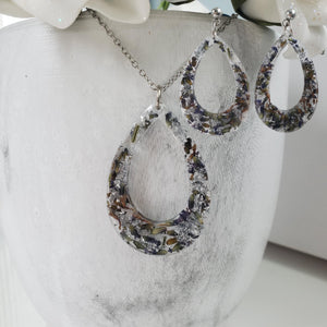 Handmade real flower teardrop pendant necklace accompanied by a matching pair of stud drop earrings made with lavender petals and silver flakes preserved in resin. Resin Jewelry, Flower Jewelry, Jewelry Sets