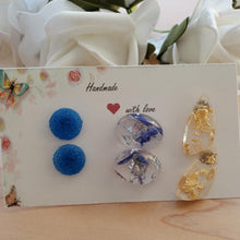 Load image into Gallery viewer, Flower Stud Earrings, Stud Earrings Set, Earrings - 3 handmade pairs of resin stud earrings - one pair of blue round druzy - one pair of real blue cornflower petals and silver flakes - 1 pair of shell shape with gold flakes