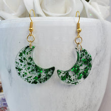 Load image into Gallery viewer, Moon Earrings - Crescent Moon Earrings - Earrings - Handmade resin crescent moon drop earrings with green flakes