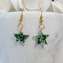 Load image into Gallery viewer, Star Earrings, Star Dangle Earrings, Earrings - handmade resin star drop earrings with green flakes