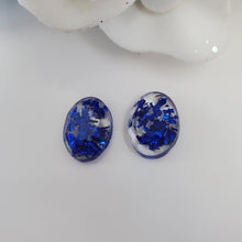 Load image into Gallery viewer, Oval Earrings, Stud Earrings, Resin Earrings, Earrings - Handmade resin oval stud earrings made with blue flakes.