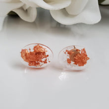 Load image into Gallery viewer, Oval Earrings, Stud Earrings, Resin Earrings, Earrings - Handmade resin oval stud earrings made with rose gold flakes.