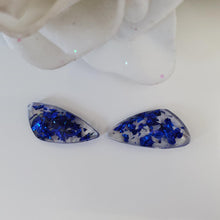 Load image into Gallery viewer, Shell Earrings, Post Earrings, Resin Earrings, Earrings - Handmade resin shell shape stud earrings made with blue flakes.