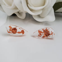 Load image into Gallery viewer, Shell Earrings, Post Earrings, Resin Earrings, Earrings - Handmade resin shell shape stud earrings made with rose gold flakes.
