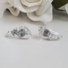 Load image into Gallery viewer, Shell Earrings, Post Earrings, Resin Earrings, Earrings - Handmade resin shell shape stud earrings made with silver flakes.