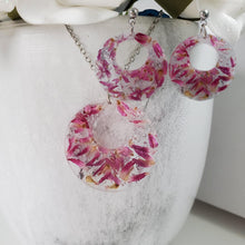 Load image into Gallery viewer, Handmade real flower circular pendant necklace accompanied by a matching pair of earrings made with red clover flowers and silver flakes preserved in resin - Dried Flower Jewelry, Bridal Gifts, Jewelry Sets