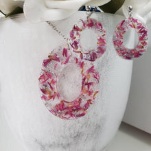 Load image into Gallery viewer, Handmade real flower oval pendant necklace accompanied by a pair of oval stud earrings made with red clover flowers and silver leaf preserved in resin. - Flower Jewelry, Blue Jewelry, Jewelry Sets