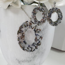 Load image into Gallery viewer, Handmade real flower oval pendant necklace accompanied by a pair of oval stud earrings made with lavender petals and silver leaf preserved in resin. - Flower Jewelry, Blue Jewelry, Jewelry Sets
