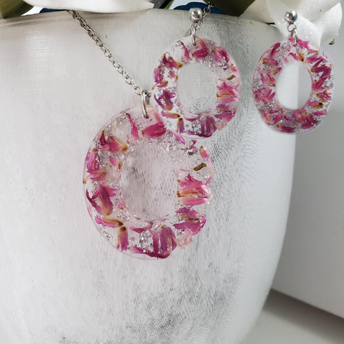 Handmade real flower oval pendant necklace accompanied by a matching pair of dangling stud earrings made with red clover flowers and silver flakes preserved in resin. - Flower Jewelry, Pink Jewelry, Jewelry Sets