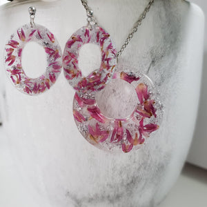 Handmade real flower circular pendant necklace accompanied by a pair of oval stud drop earrings made with red clover flowers and silver flakes preserved in resin. - Flower Jewelry, Purple Jewelry, Jewelry Sets