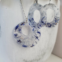 Load image into Gallery viewer, Handmade real flower circular pendant necklace accompanied by a pair of oval stud drop earrings made with blue cornflower and silver flakes preserved in resin. - Flower Jewelry, Purple Jewelry, Jewelry Sets