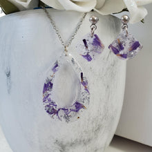 Load image into Gallery viewer, Handmade real flower teardrop pendant necklace accompanied by a pair of shell shape stud drop earrings made with purple statice and silver flakes preserved in resin. - Jewelry Sets, Flower Jewelry, Purple Jewelry