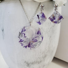 Load image into Gallery viewer, Handmade real flower circular pendant necklace accompanied by a pair of shell shape stud drop earrings made with statice and silver flakes preserved in resin. - Jewelry Sets, Flower Jewelry, Purple Jewelry