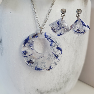 Handmade real flower circular pendant necklace accompanied by a pair of shell shape stud drop earrings made with blue cornflower and silver flakes preserved in resin. - Jewelry Sets, Flower Jewelry, Purple Jewelry