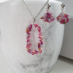 Handmade real flower oval pendant necklace accompanied by a matching pair of dangling stud earrings made with red clover flowers and silver flakes preserved in resin. - Red Jewelry, Jewelry Sets, Flower Jewelry