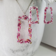 Load image into Gallery viewer, Handmade real flower rectangular pendant necklace accompanied by a matching pair of stud earrings made with red clover flowers and silver flakes. Blue Jewelry, Flower Jewelry, Jewelry Sets