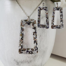 Load image into Gallery viewer, Handmade real flower rectangular pendant necklace accompanied by a matching pair of stud earrings made with lavender petals and silver flakes. Blue Green Jewelry, Flower Jewelry, Jewelry Sets