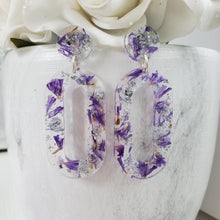 Load image into Gallery viewer, Handmade real flower long oval post earrings made with purple statice and silver leaf preserved in resin. - Flower Earrings, Blue Earrings, Dangle Earrings