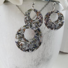 Load image into Gallery viewer, Handmade real flower circular pendant necklace accompanied by a matching pair of stud earrings made with lavender petals and silver leaf preserved in resin. - Resin Jewelry, Bridal Sets, Jewelry Sets