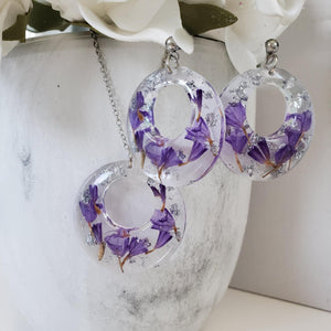 Handmade real flower circular pendant necklace accompanied by a matching pair of stud earrings made with purple statice and silver leaf preserved in resin. - Resin Jewelry, Bridal Sets, Jewelry Sets
