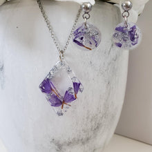 Load image into Gallery viewer, Handmade real flower diamond shape pendant necklace accompanied by a pair of circular post earrings made with purple statice and silver leaf preserved in resin. - Bridal Jewelry, Pink Jewelry, Jewelry Sets