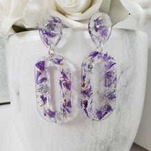 Load image into Gallery viewer, Handmade real flower long oval dangle earrings made with purple statice and silver leaf preserved in resin. - Flower Earrings, Blue Earrings, Resin Jewelry