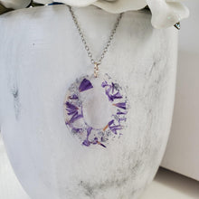 Load image into Gallery viewer, Handmade real flower oval pendant necklace made with purple statice and silver flakes preserved in resin. - Purple Necklace, Flower Necklace, Pendant Necklace