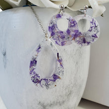 Load image into Gallery viewer, Handmade real flower teardrop pendant accompanied by a pair of circular stud earrings made with purple statice and silver leaf preserved in resin. - Flower Jewelry, Jewelry Set, Bridal Sets