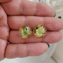 Load image into Gallery viewer, Handmade tiny real flower stud earrings preserved in resin. - green and gold - Flower Post Earrings, Resin Earrings, Round Earrings
