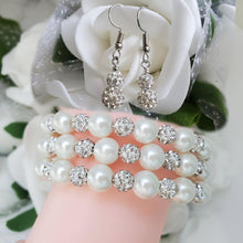 Load image into Gallery viewer, Handmade pearl and crystal rhinestone expandable, multi-layer, wrap bracelet accompanied by a pair of crystal drop earrings, ivory or custom color - Bracelet Sets - Bridal Sets - Wedding Sets