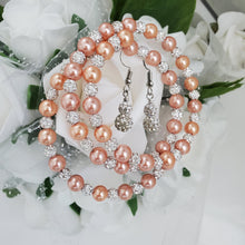 Load image into Gallery viewer, Handmade pearl and crystal rhinestone expandable, multi-layer, wrap bracelet accompanied by a pair of crystal drop earrings, powder orange or custom color - Bracelet Sets - Bridal Sets - Wedding Sets