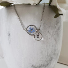 Load image into Gallery viewer, Handmade real flower initial necklace made with a forget me not flower preserved in resin. rhodium or gold  - Forget Me Not Necklace - Monogram Necklace - Necklaces