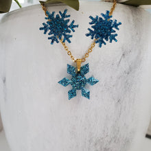 Load image into Gallery viewer, Handmade snowflake glitter drop necklace pendant accompanied by a pair of stud earrings. blue or custom color - flake Jewelry Set - Winter Jewelry - Jewelry Sets