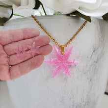 Load image into Gallery viewer, Handmade snowflake drop necklace accompanied by a pair of stud earrings made with glitter preserved in resin. pink or custom color - Snowflake Necklace Set - Winter Jewelry - Jewelry Sets