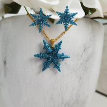 Load image into Gallery viewer, Handmade snowflake drop necklace accompanied by a pair of stud earrings made with glitter preserved in resin. blue or custom color - Snowflake Necklace Set - Winter Jewelry - Jewelry Sets