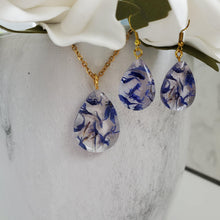 Load image into Gallery viewer, Handmade real flower teardrop pendant accompanied by a matching pair of drop earrings made with blue cornflower preserved in resin. - Teardrop Jewelry, Flower Jewelry, Jewelry Sets