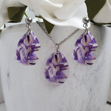 Load image into Gallery viewer, Handmade real flower teardrop pendant accompanied by matching stud earrings made with purple statice preserved in clear resin. - Flower Jewelry, Teardrop Jewelry, Jewelry Sets