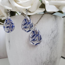 Load image into Gallery viewer, Handmade real flower teardrop pendant accompanied by matching stud earrings made with blue cornflower preserved in clear resin. - Flower Jewelry, Teardrop Jewelry, Jewelry Sets